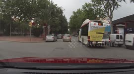 Distracted driver almost runs over a family with a baby