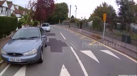Car does not stop and pulls across cyclist.