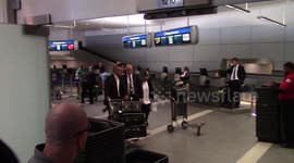 Kourtney Kardashian gets mobbed by the paparazzi as she is flanked by more security then usual upon her return to the US following her sister Kim being robbed at gunpoint in Paris, France over the weekend
