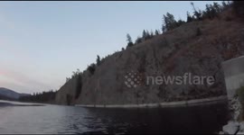 Guy passes out after jumping off a 100 foot cliff!!!!!