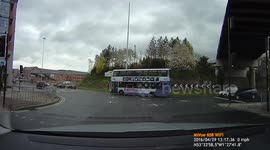 Bus jumping red light.