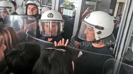 Violent clashes between protesters and police outside Greek courthouse