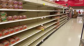 Florida supermarket staff re-stocking after Hurricane Matthew panic buying