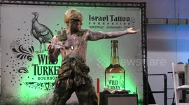Side Rambo injects Juicy Juice into his muscle during Freak Show