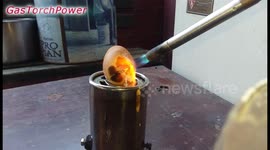 Watch this video of an egg get DESTROYED by a gas torch flame