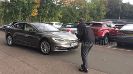 Feeding a Tesla car scooby battery snacks