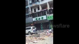 Four injured as residential building explodes in southern China