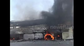 Coach catches fire on motorway in China