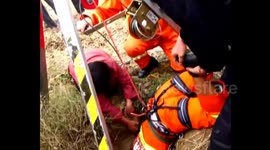 Firefighters rescue a boy falling into a deep well
