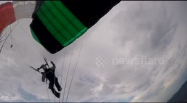 Skydiver hits another skydiver's canopy mid-flight