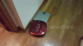 Robot Vacuum Cleaner bumping bathroom scale