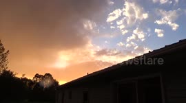 'Strange' sky goes from clear blue to stormy orange and rainbows
