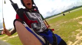 Skydiver kicks GoPro hard as he lands