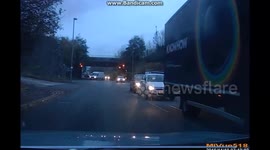 Gung-ho driver causes crash at a Roundabout (UK Dashcam footage)