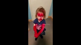 Little girl covers herself in lipstick to 'look like Spiderman'
