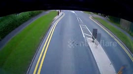 Brainless biker overtakes lorry, crashes into van and angrily throws gloves in hedge