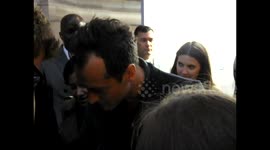 Jude Law signs autographs for fans in London