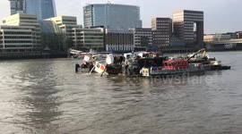 Thames pleasure boat capsizes