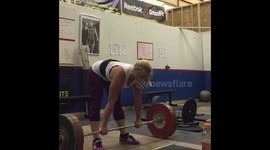 Girl lifting 90kg clean and jerk
