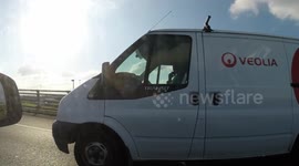141-D-9337 Ford Veolia driver talking on the phone M1 M50 05-10-2016