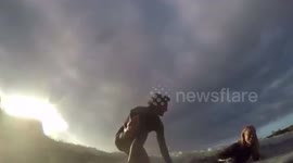 Surfer proposes to girlfriend while riding the famous Severn Bore