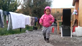 Young child Inside Grande Synthe migrant refugee camp in France