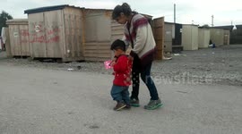 Young children in Grande Synthe refugee migrant camp in France
