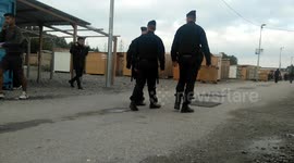 CRS Police in Grande Synthe Refugee Camp, France.