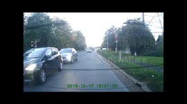 Saab driver pulls dangerous U Turn in front of a Lorry