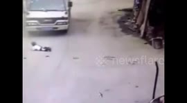 Child survives being run over in China