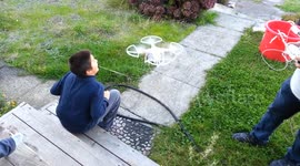 Dad pulls out son's loose tooth with drone