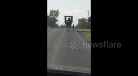 Newsflare Edit - Driver late for work as Amish horse-and-cart blocks road