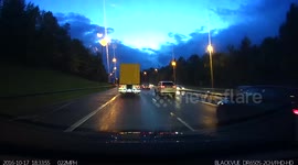 Raw footage - Sudden breakdown in live motorway carriageway - near accident (front)