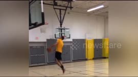 Absolutely incredible basketball trick shot