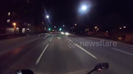 Biker experiences horrible crash with car doing second U-turn