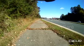 Rear Dashcam on Cyclist Captures Flying Car Wheel