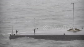 Thrill-seekers take selfie in middle of a typhoon