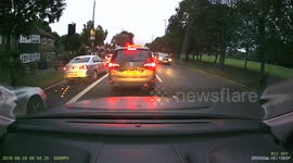 Near miss woman and motorbike.