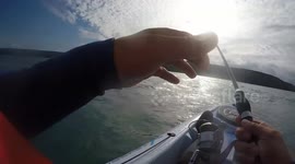 Boys Mackerel Fishing on a Kayak off Gul Rock Portreath Cornwall in October