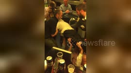 Amazing elderly woman does the paquito and a headstand on French train