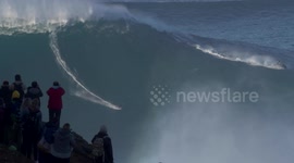 Sebastian Steudtner rides giant wave in Nazare, Portugal