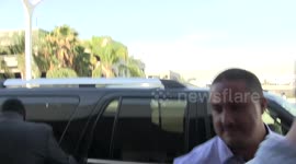Singer Jessica Simpson strongly denies being pregnant as she arrives at LAX Airport in Los Angeles, Ca and takes time to sign autographs for the autograph collectors