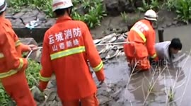Firefighters rescue boy stuck in quicksand