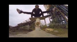 Chinese man performs balancing tricks in construction site