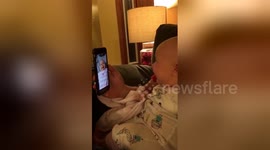 Baby reacts to seeing herself on video