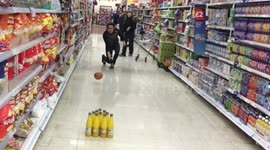 YouTuber plays 'pumpkin bowling' in supermarket