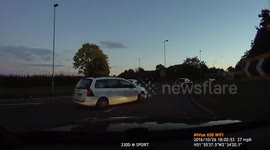UK Bad Drivers : Car driver fails to stop at roundabout