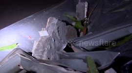 Massive concrete block falls and crushes car