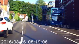 Truck stopping on island and reversing without warning