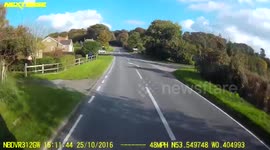 Idiot pulling out of a junction